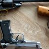 Revolvers for Survival | The Best Guns That Stood The Test Of Time three-revolvers-on-wood-b-8b807b6bb3ef8481bec579cc3fb427ca77fc9ea4